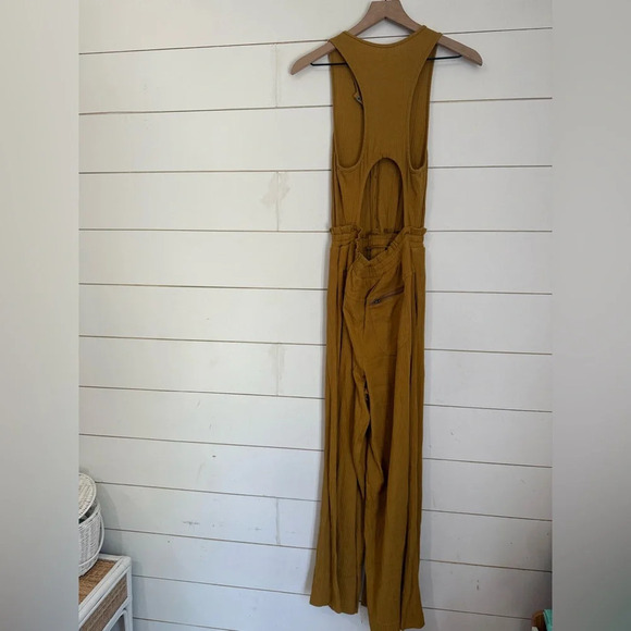 Free People Movement Caught My Tempo Jumpsuit Open back wide leg S - Picture 8 of 10